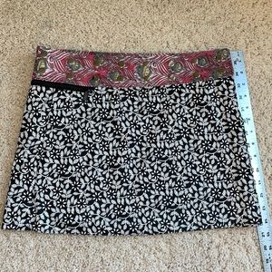 Adjustable, reversible, wrap skirt with snaps